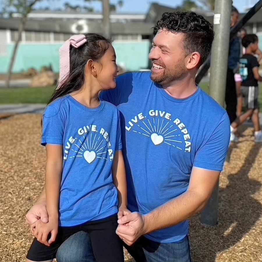 Live. Give. Repeat. (Youth Tee), a Heather True Royal Premium Youth Tee