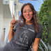 But First? Carole. | The Good Neighbor Drop, a Dark Grey Heather Premium Unisex Tee