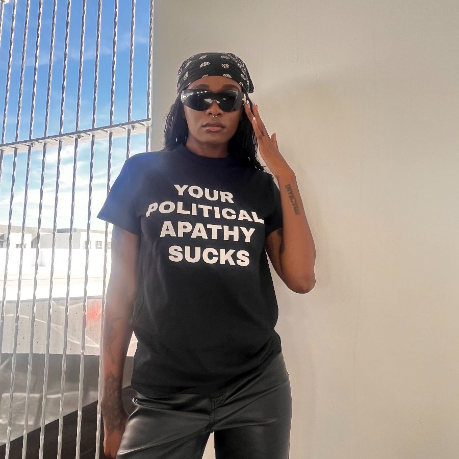 YOUR POLITICAL APATHY SUCKS Tee, a Black Classic Unisex Tee
