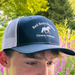 Red Barn Stables Trucker Cap, a Navy/ White Printed Snapback Trucker Cap