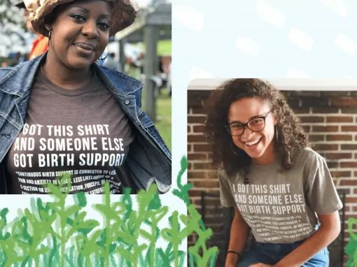 Two women wearing t-shirts that support a local charity