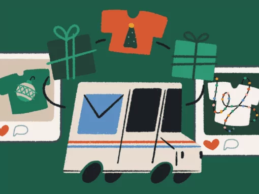 Festive mail truck surrounded by holiday gifts and christmas-themed shirts.