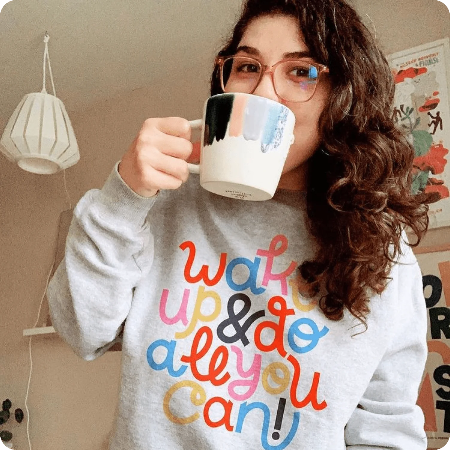 Sweatshirt featuring oversized colorful typography used for bold statement messaging.