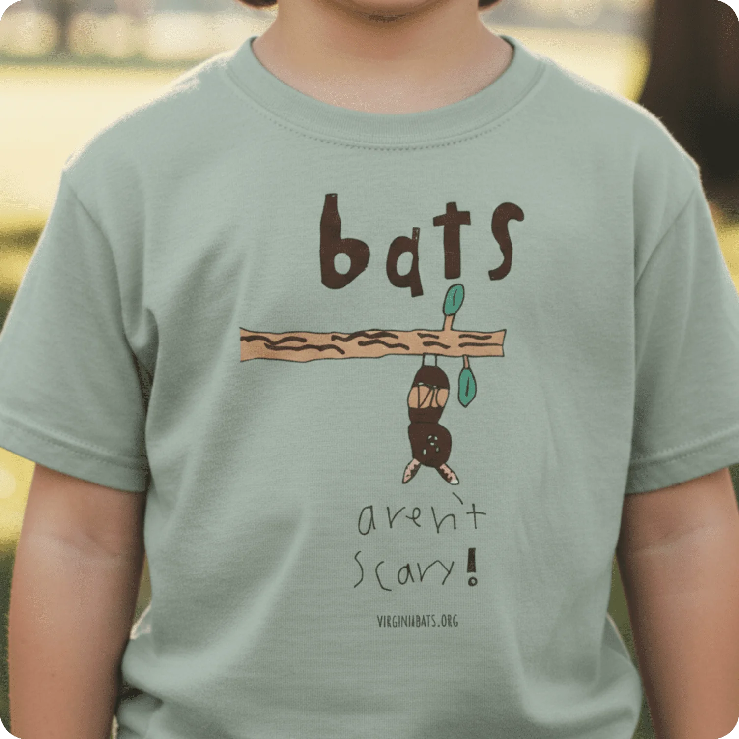 Youth t-shirt featuring playful hand-drawn illustration created in a childlike style.