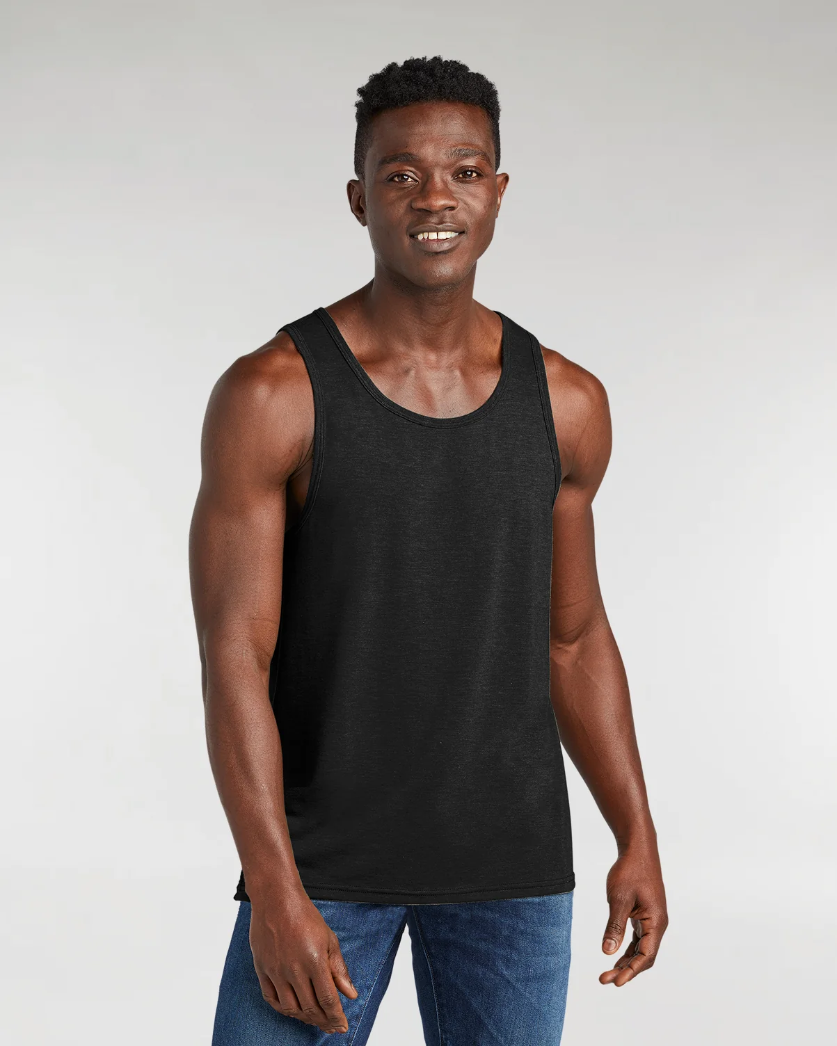 Black eco triblend tank top from Allmade on a model.
